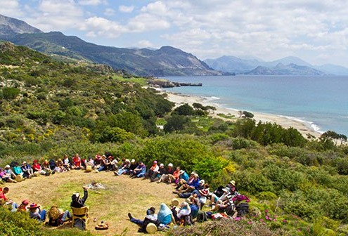 Shamanic pilgrimage to Crete with students sitting in a ceremonial circle.